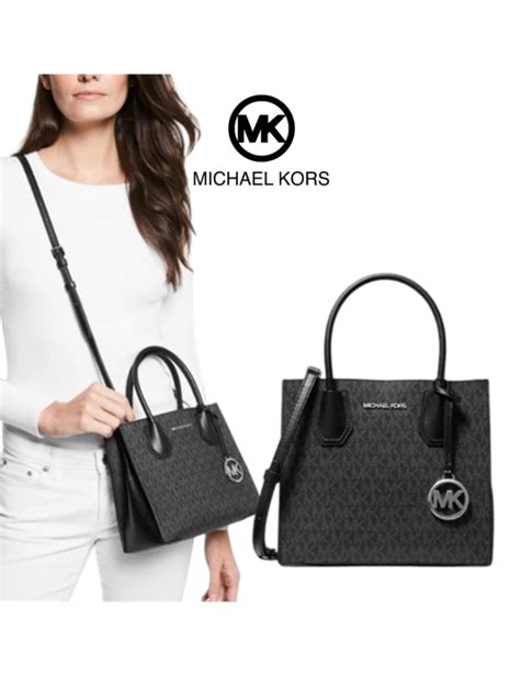 mala michael kors preta